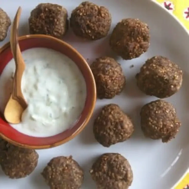 Irresistible Kibbeh Meatballs with Spiced Yogurt Sauce - Middle Eastern Delight