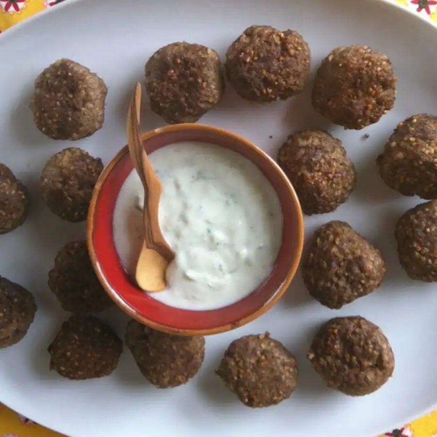 Irresistible Kibbeh Meatballs with Spiced Yogurt Sauce - Middle Eastern Delight